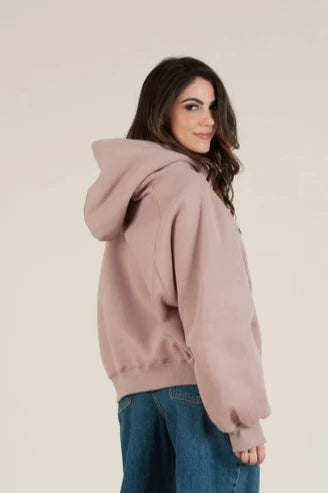 Back view of women's pink fleece hooded sweatshirt