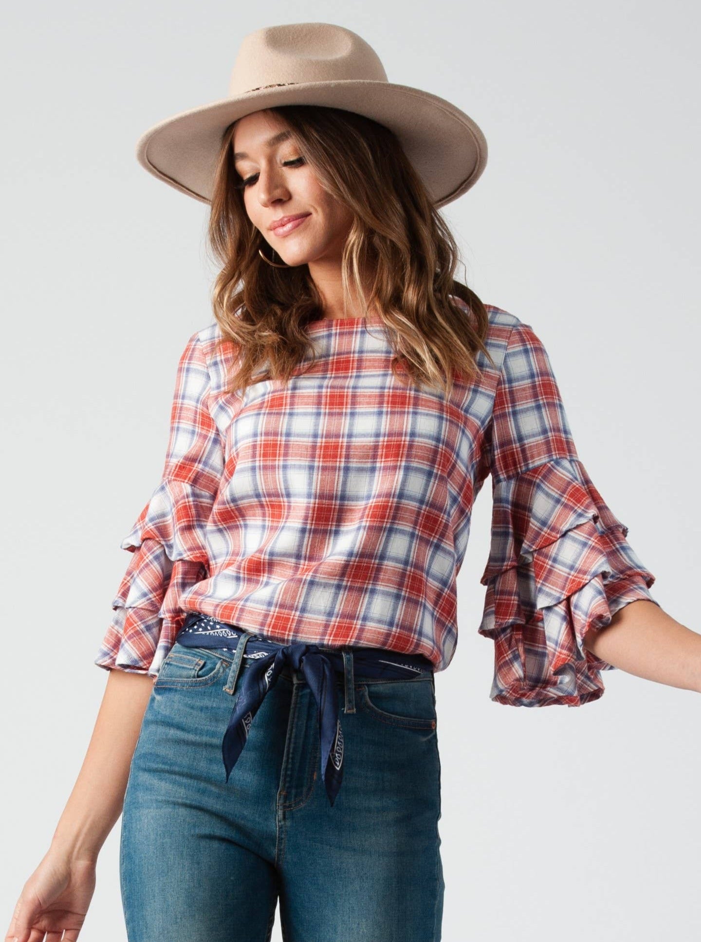 INDIANA RUFFLE PEPLUM BLOUSE-RUST PLAID