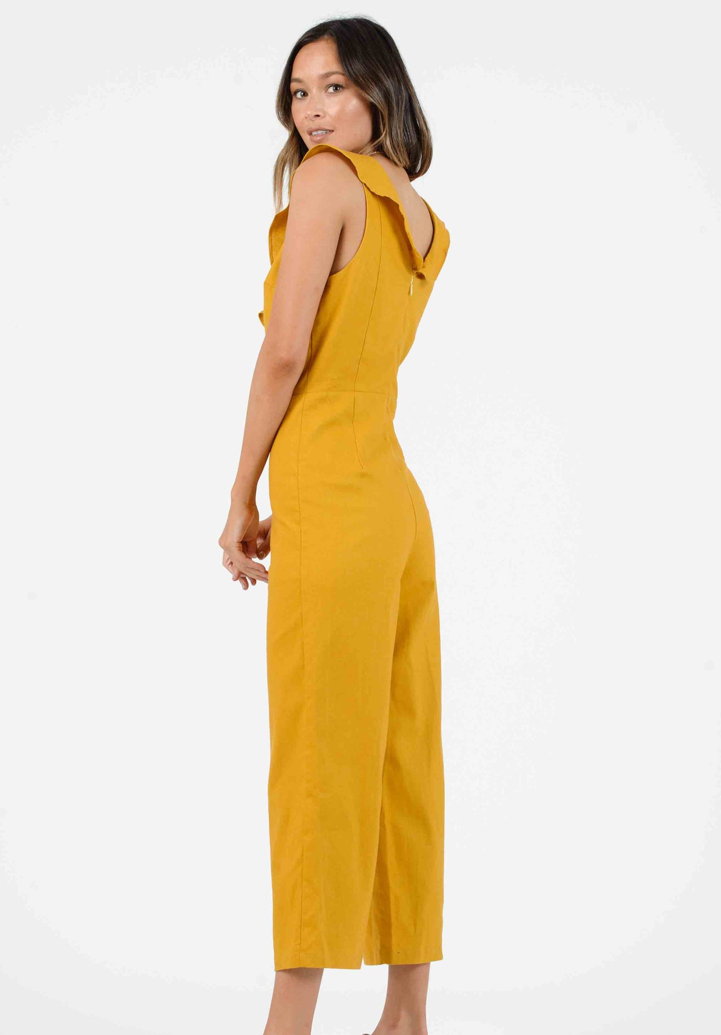MAUI CROSS RUFFLE JUMPSUIT | MUSTARD